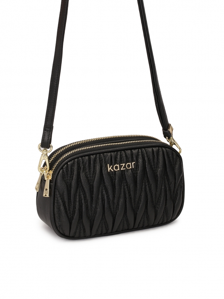 Pikowana mała torebka z regulowanym paskiem