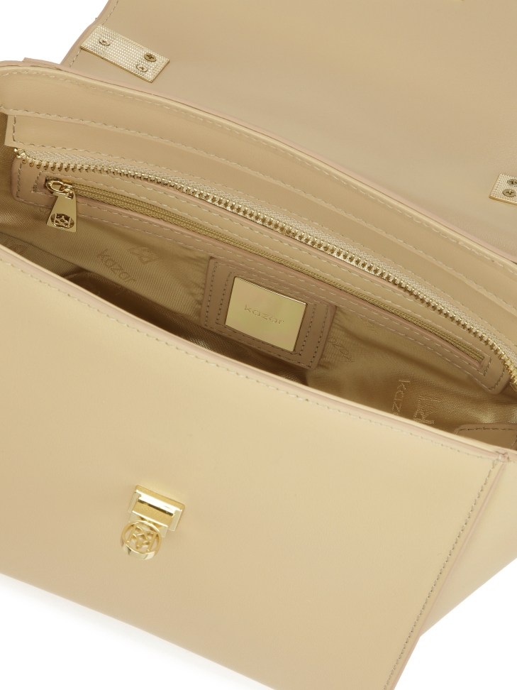 Beżowa torebka z wysuniętymi bokami