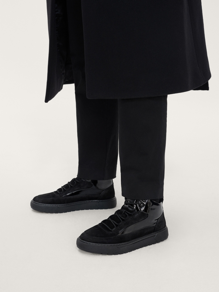 Czarne skórzane sneakersy z połyskującymi elementami