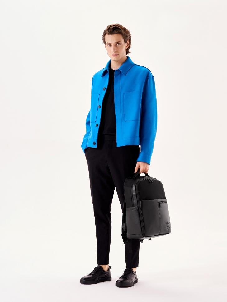 Czarny duży plecak męski z tkaniny i skóry syntetycznej