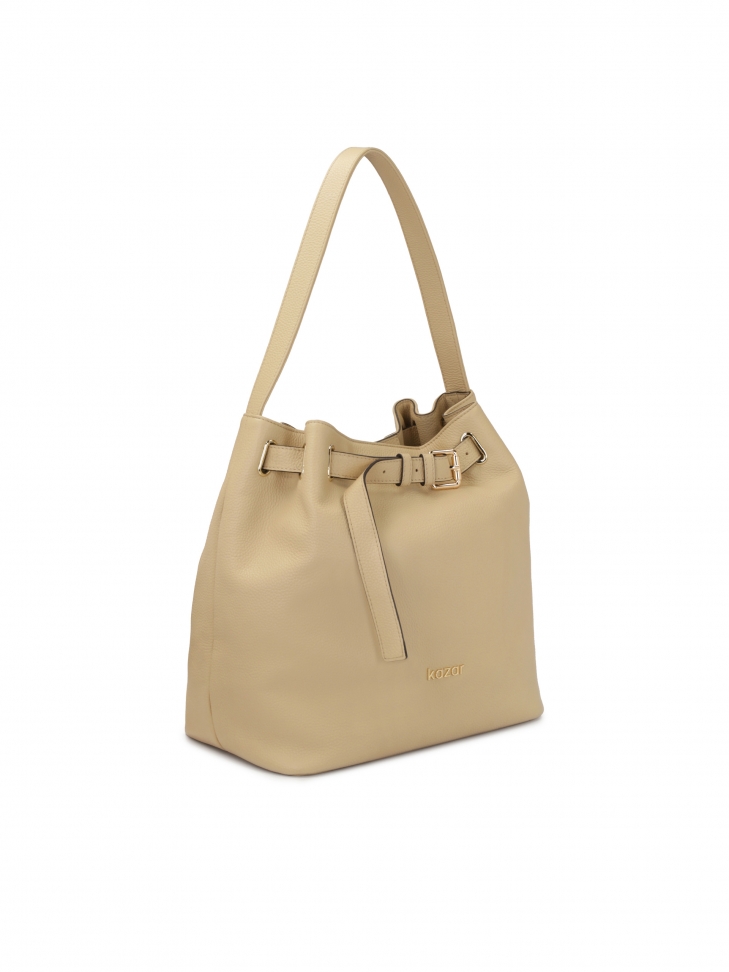 Beżowa torebka w kształcie worka