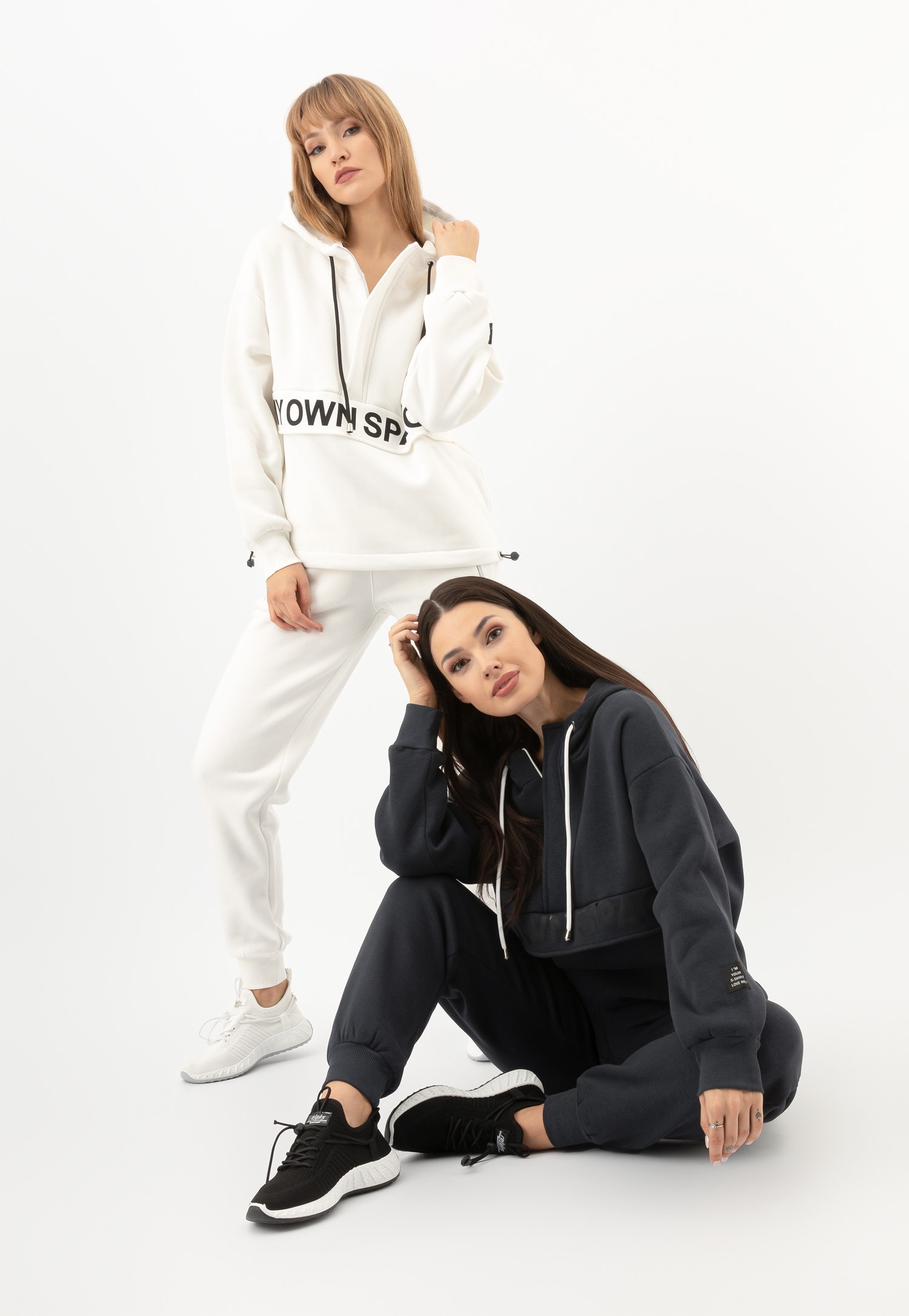 RELAKS białe spodnie damskie dresowe z zapięciem na zamek