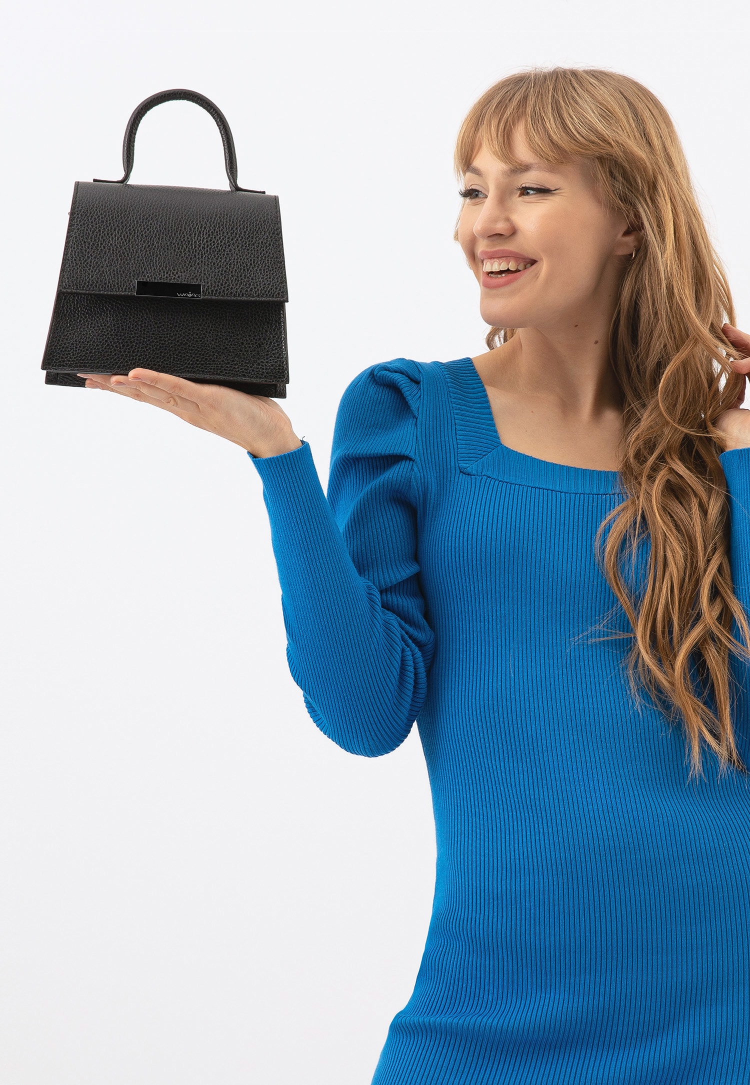 Skórzana torebka damska w kolorze jasnego beżu