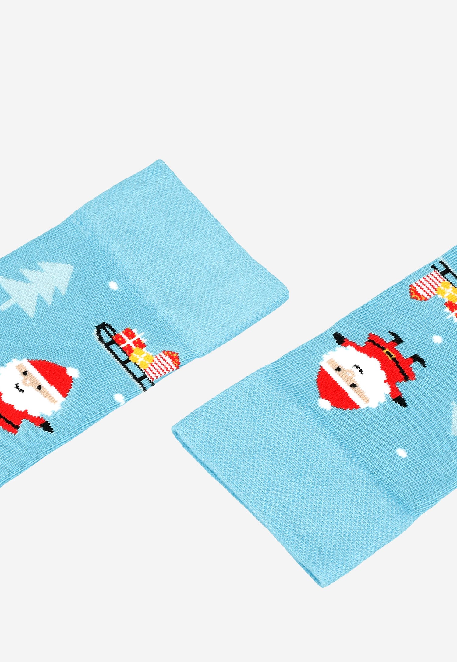 Wysokie niebieskie skarpety w Świętego Mikołaja i sanie z prezentami