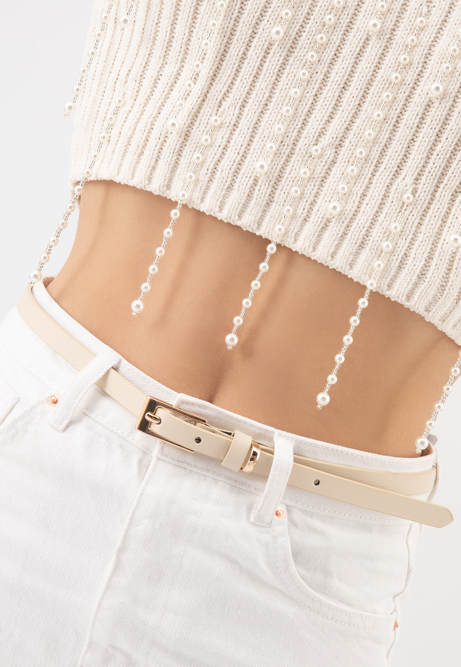 Cienki beżowy pasek damski ze skóry licowej