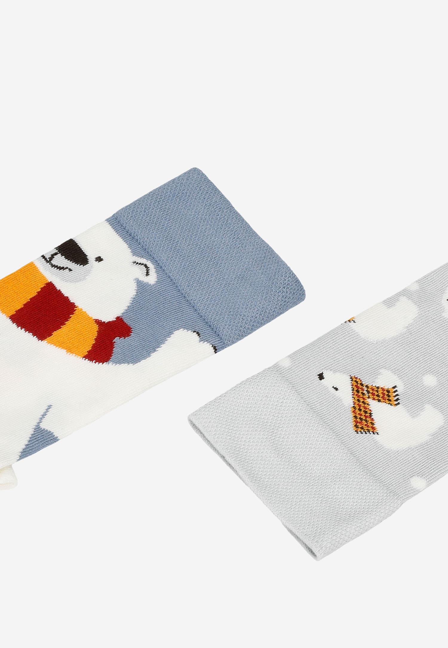 Niebiesko-żółte skarpety w pingwiny