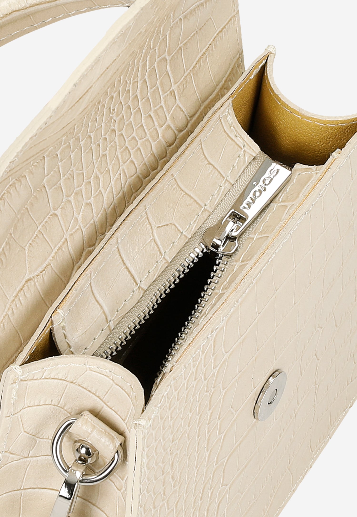 Skórzana torebka damska w kolorze jasnego beżu