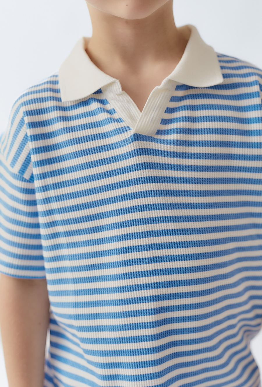 Koszulka polo w niebieskie paski