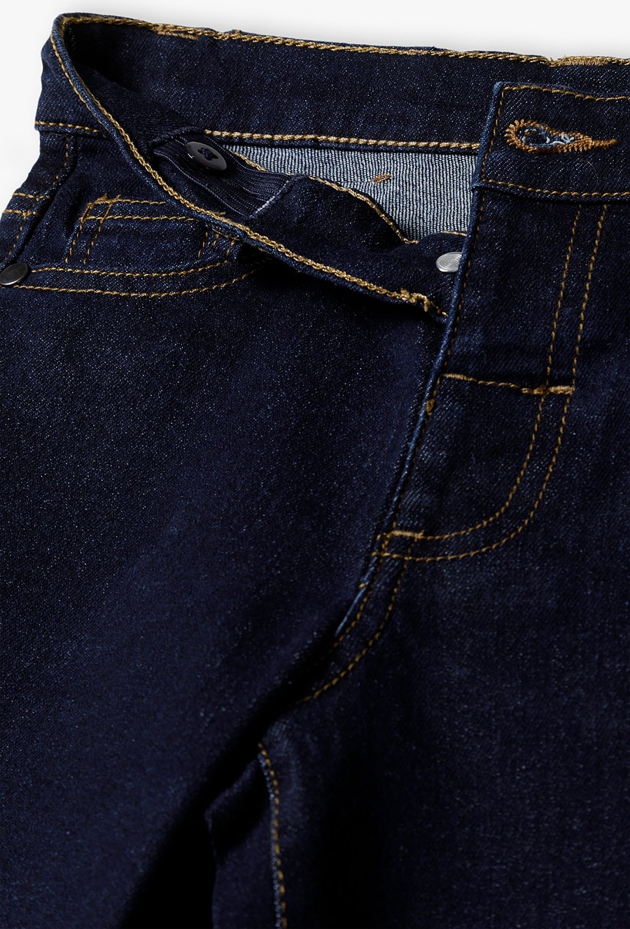 Granatowe spodnie jeansowe dla chłopca