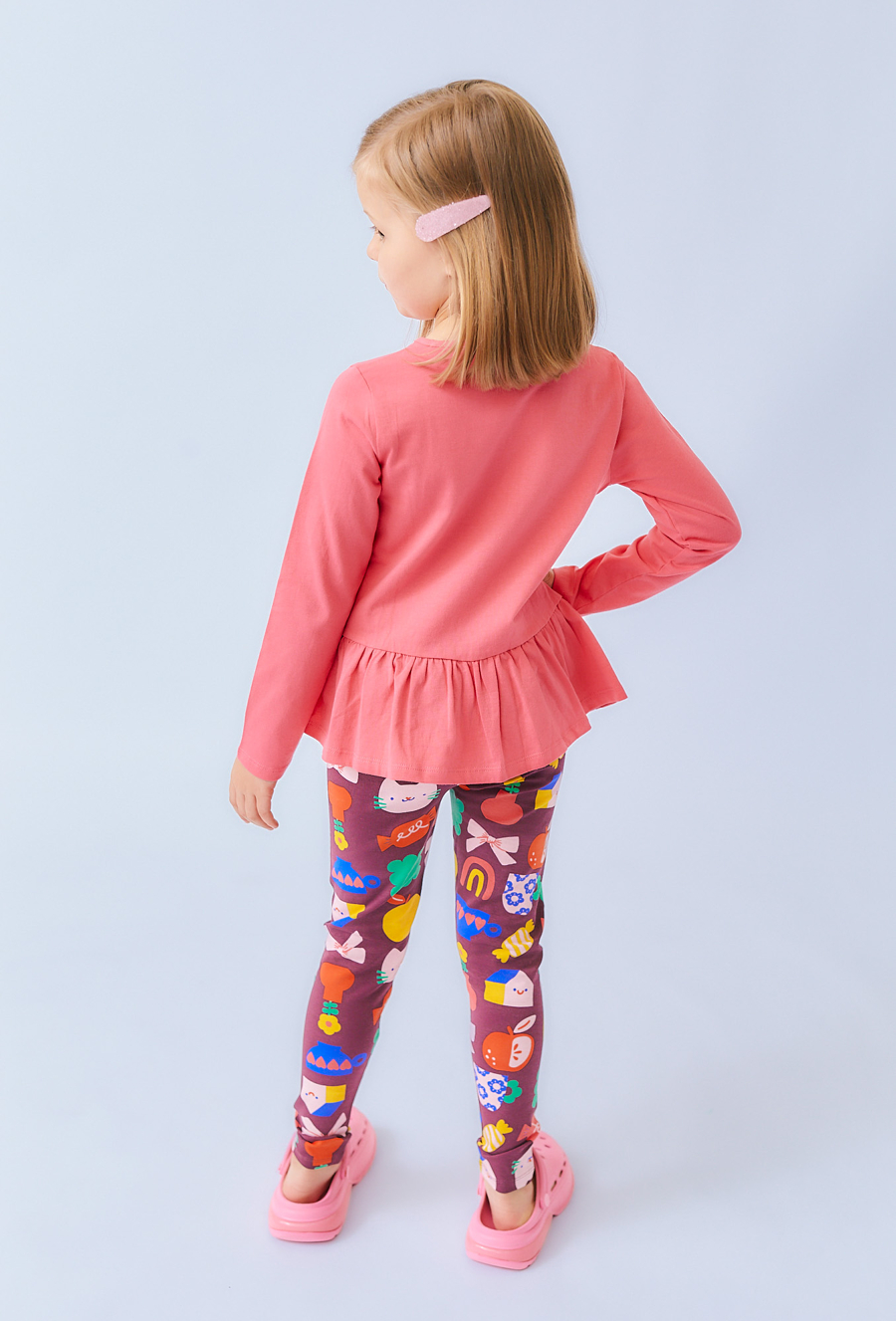 Różowa bluzka dziewczęca z falbanką