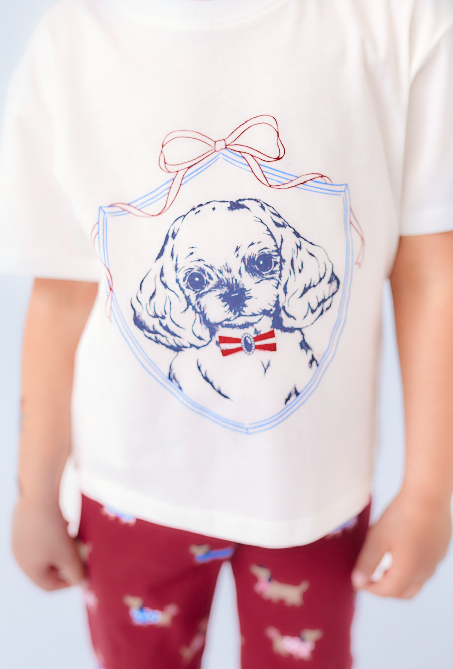 Koszulka dziewczęca ecru z nadrukiem psa – luźny ój.