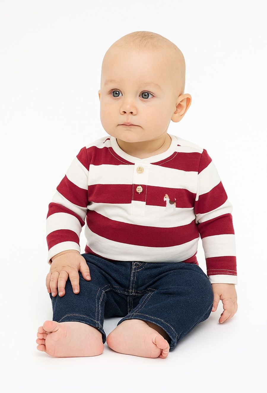 Bluzka dziecięca w czerwono-białe paski.