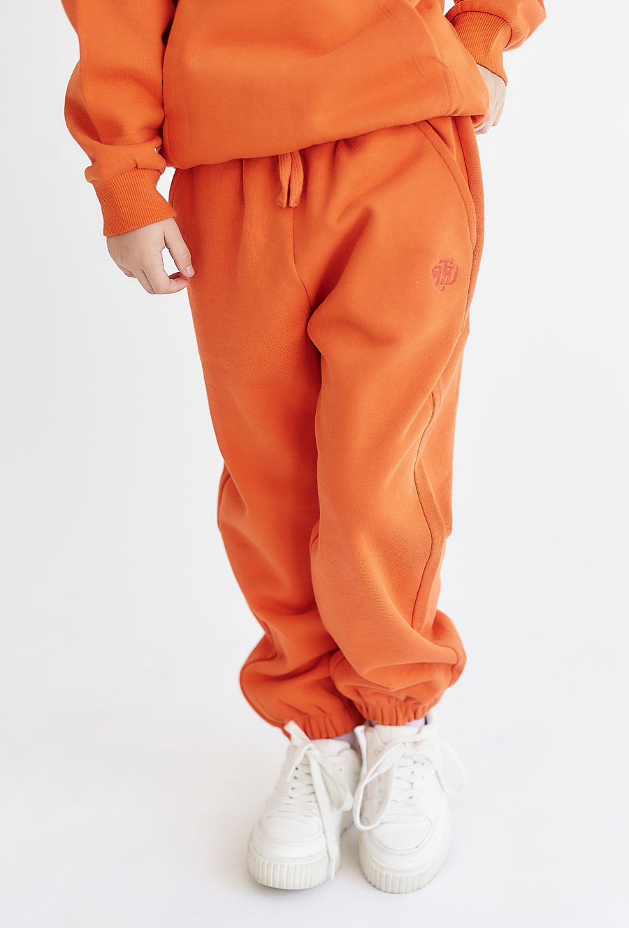 Pomarańczowe spodnie dresowe - unisex - Limited Edition