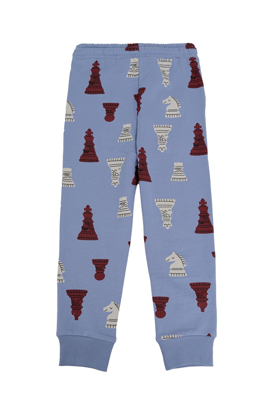 Niebieskie spodnie dresowe z nadrukiem szachowym.