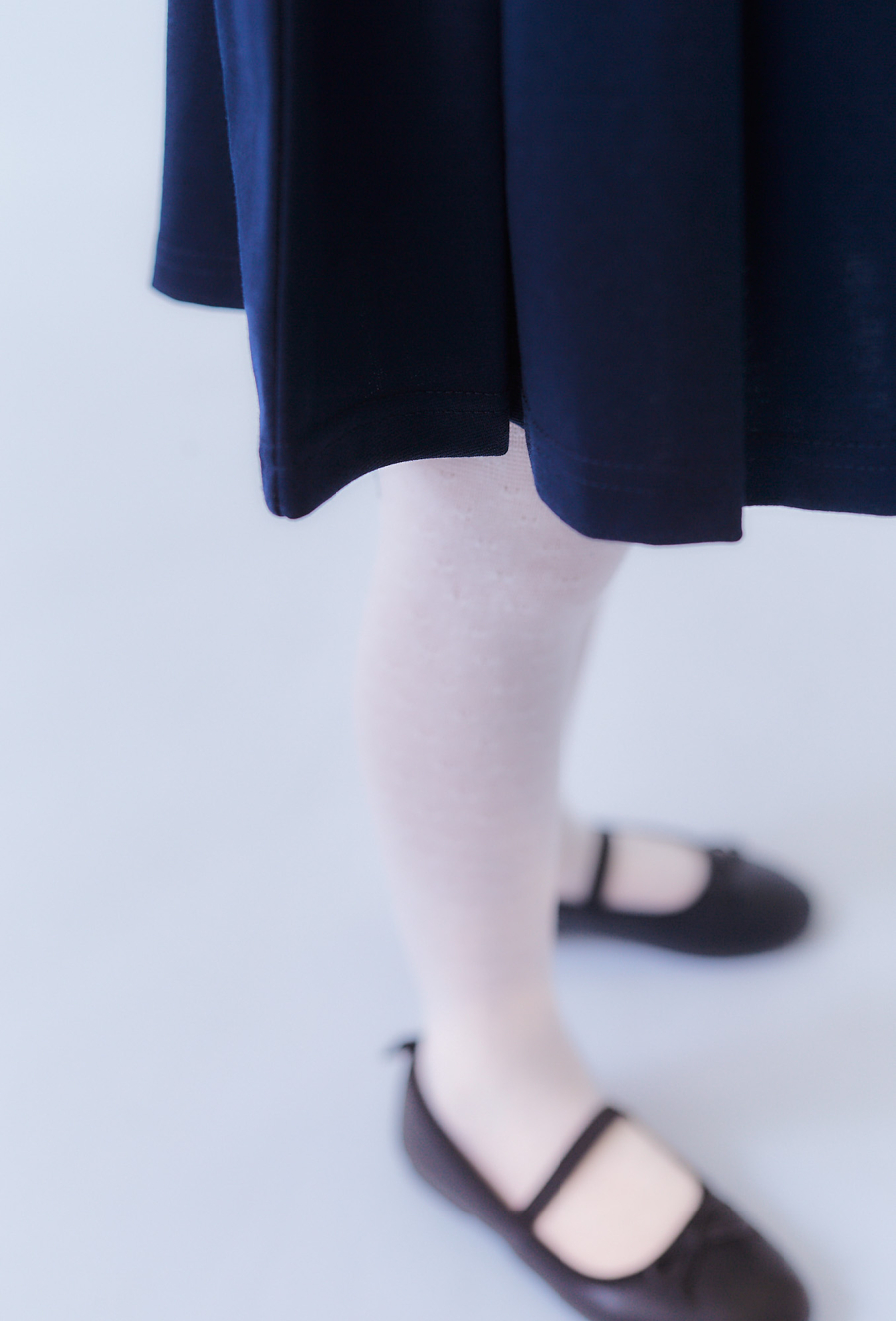 Spódnica granatowa z zakładkami i paskiem