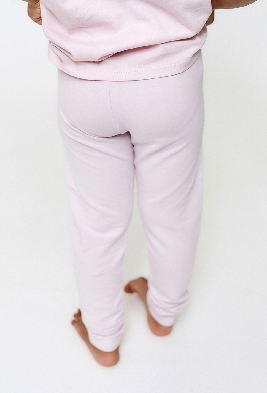 Jasnoróżowe legginsy z motylkami