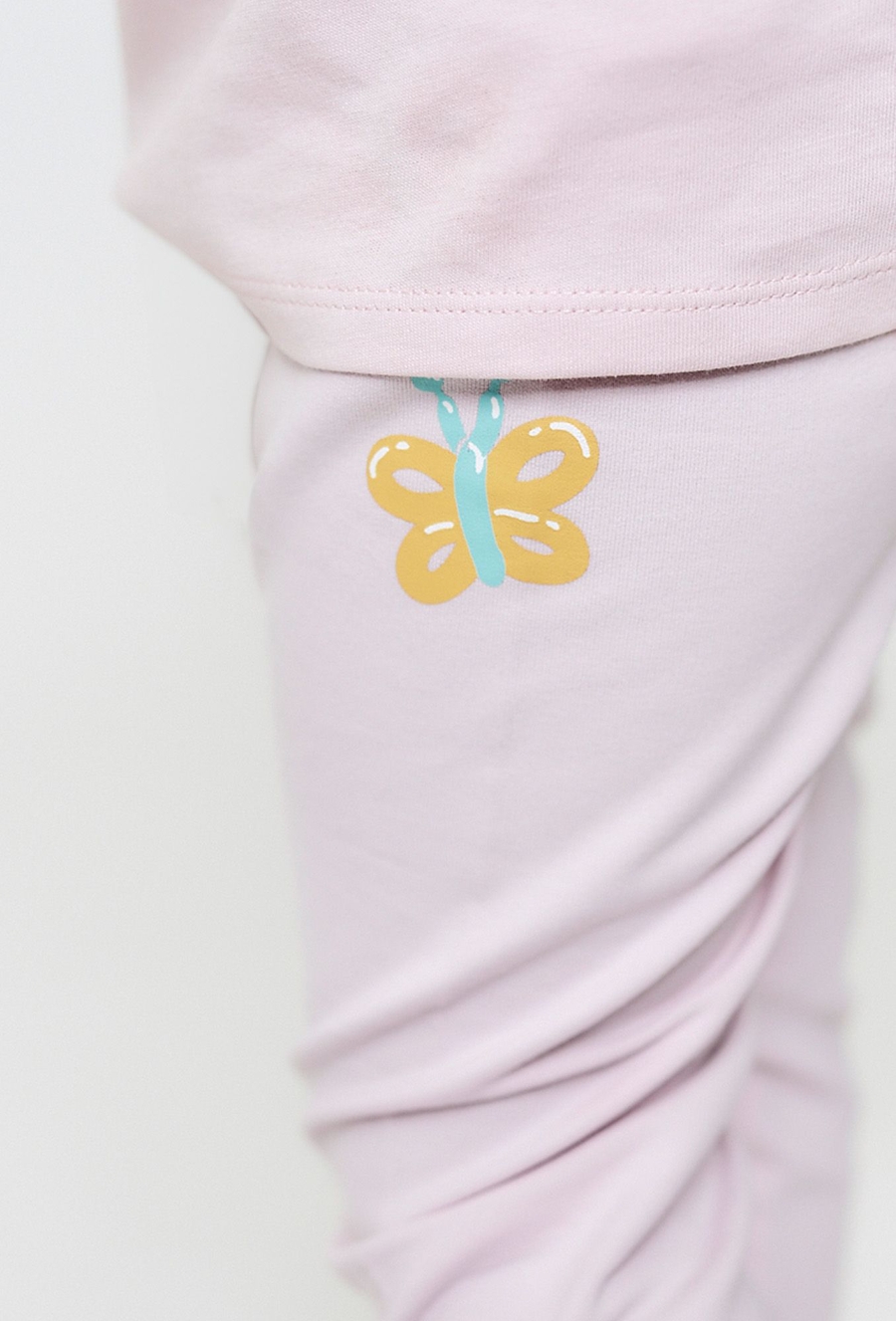 Jasnoróżowe legginsy z motylkami