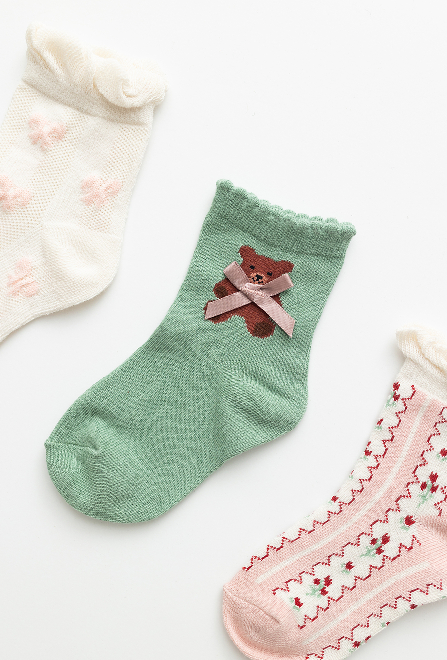 Skarpety dziewczęce 3-pak z kokardką i kwiatkami.