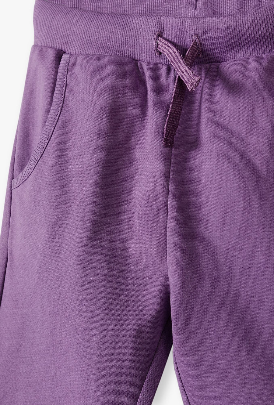 Fioletowe spodnie dresowe slim dla dziecka - 510.15.