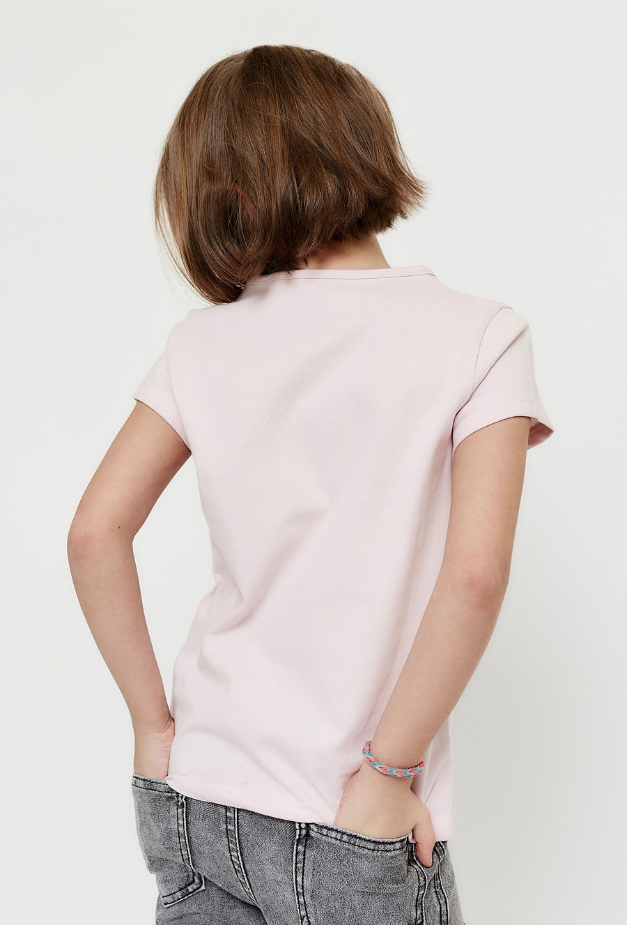 T-shirt dziewczęcy różowy z kokardką z koralików