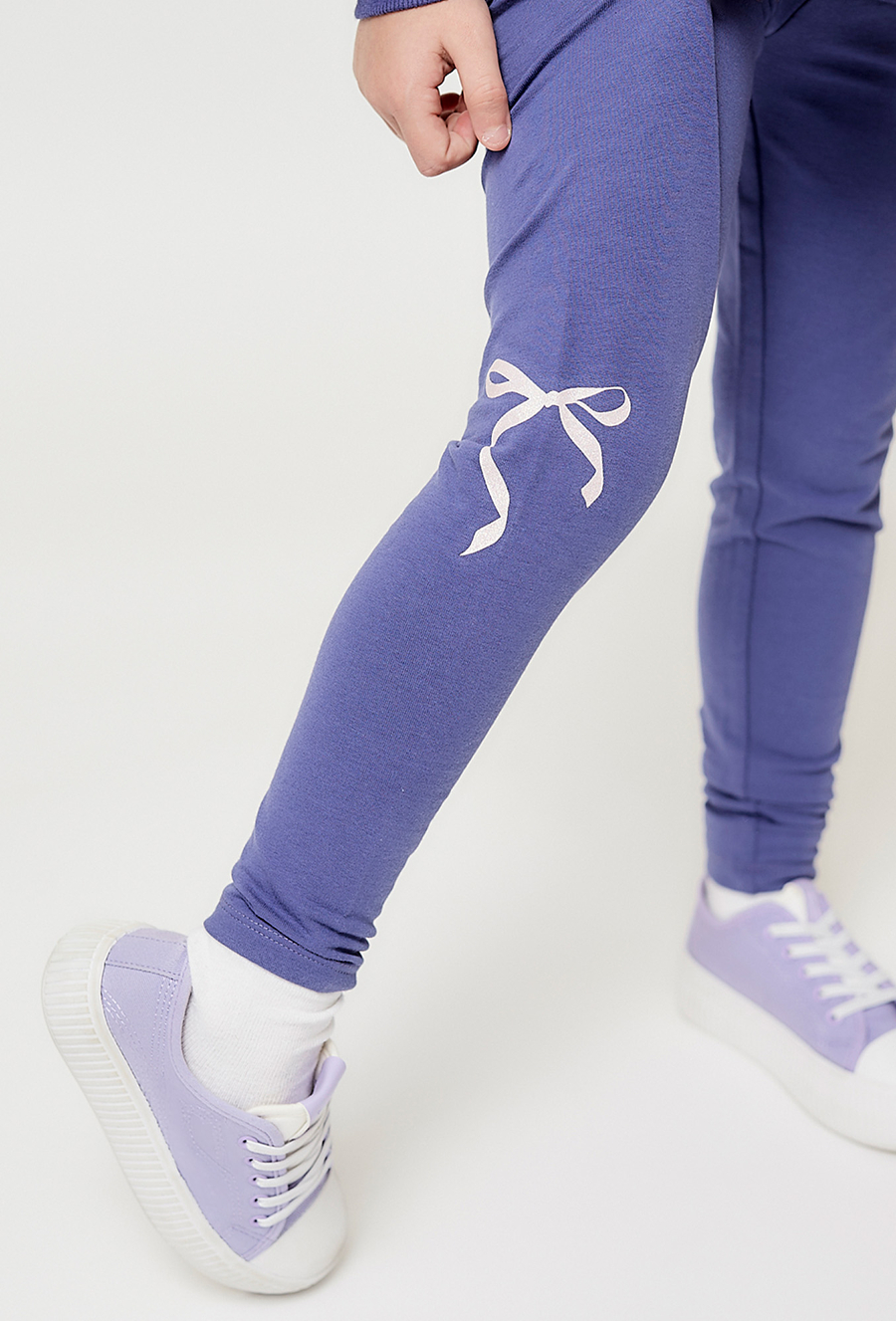 Granatowe legginsy dziewczęce z ozdobną wstążką - 510.15.