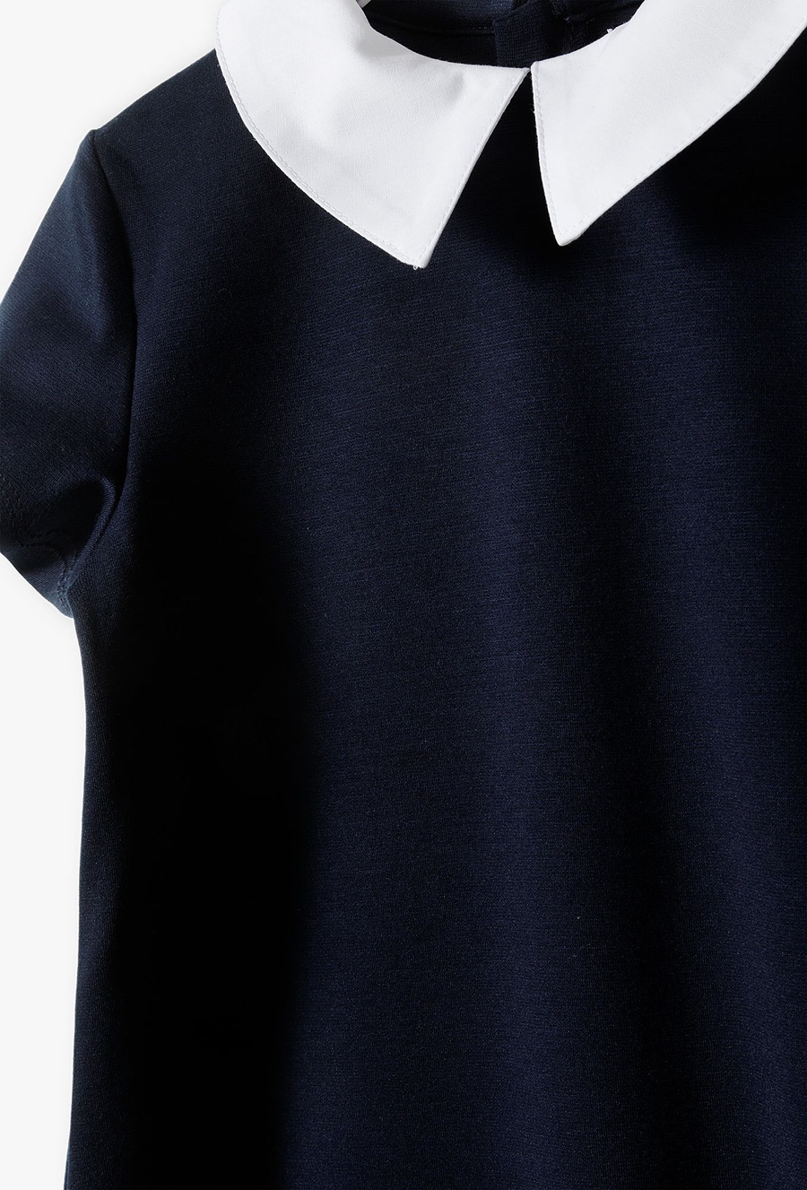 Granatowa sukienka dziewczęca z białym kołnierzykiem