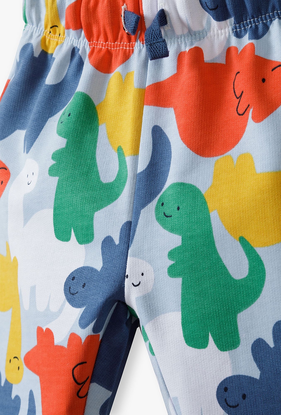 Bawełniane spodnie dresowe niemowlęce w kolorowe dinozaury