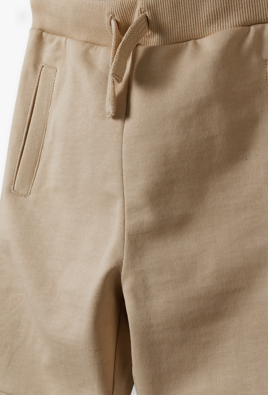 Spodnie dresowe dla chłopca - beżowe - 510.15.