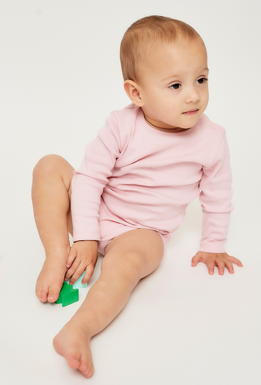 Jasnoróżowe gładkie body z długim rękawem