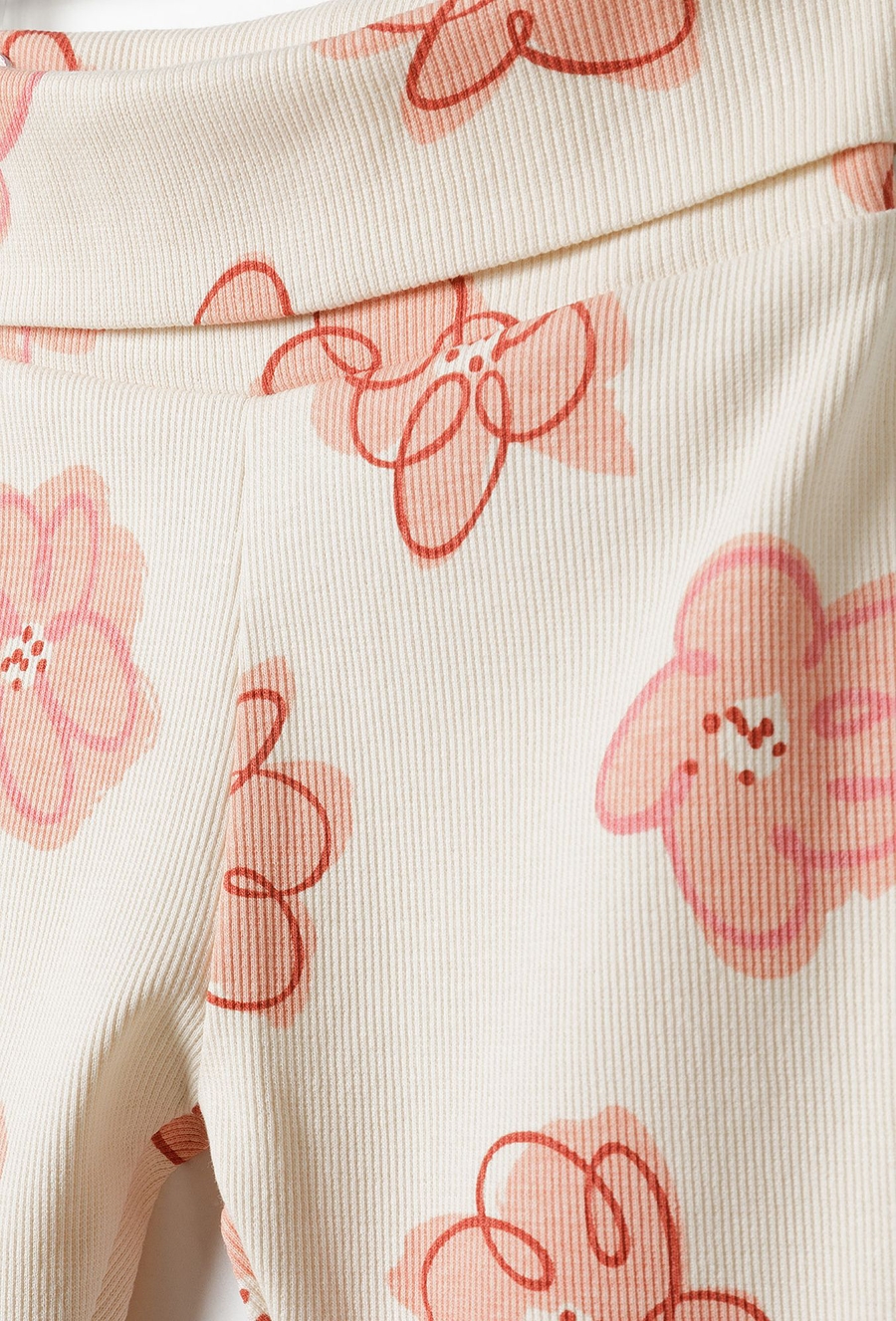 Legginsy niemowlęce w kwiaty z dzianiny prążkowanej