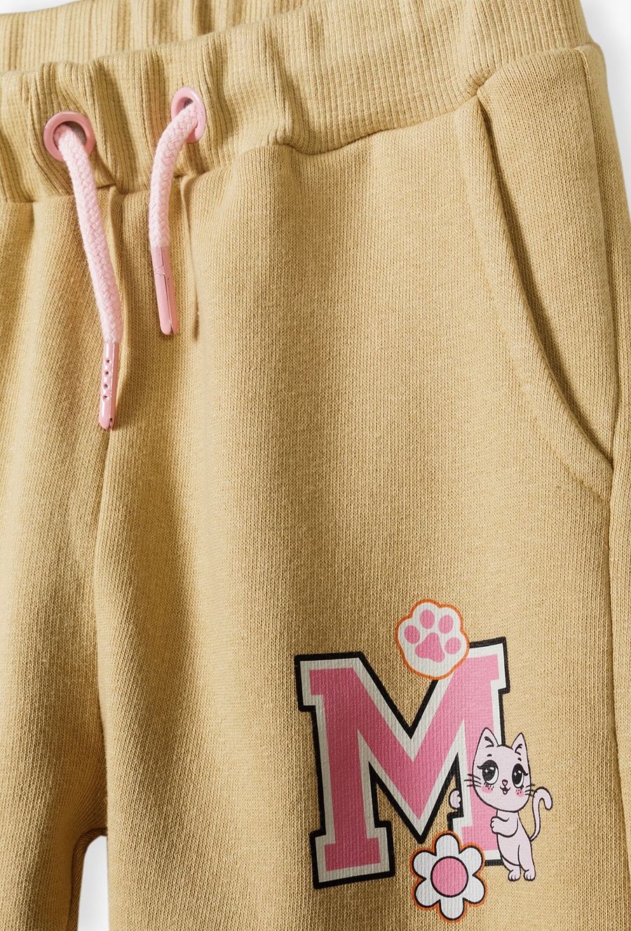 Spodnie dresowe dla dziewczynki - beżowe z kotkiem - 510.15.