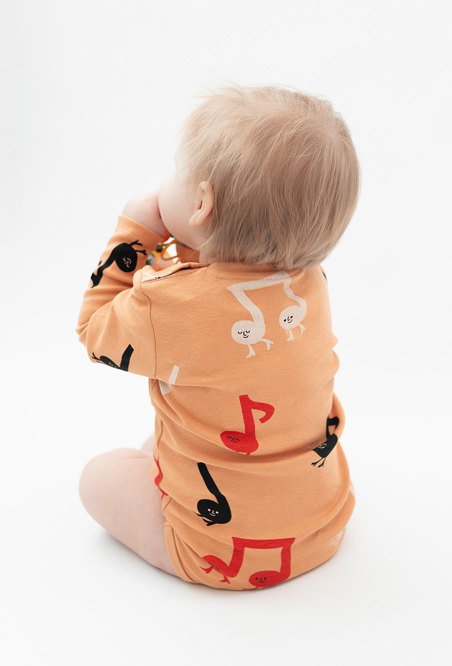 Body z długim rękawem - kolorowe nutki