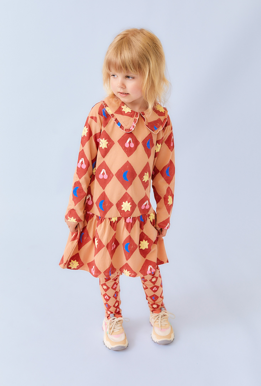 Pomarańczowa sukienka z cyrkowym nadrukiem - Limited Edition