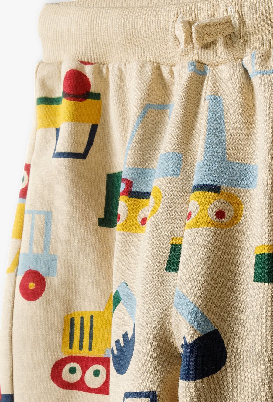 Spodnie dresowe dla niemowlaka - beżowe w samochody - 510.15.