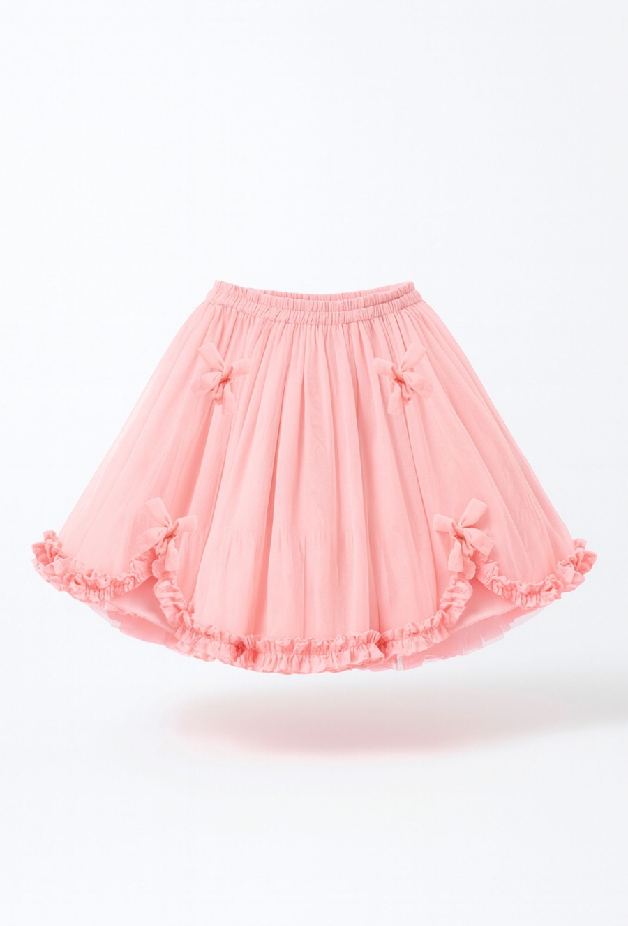 Tiulowa spódnica z kokardkami i falbanami