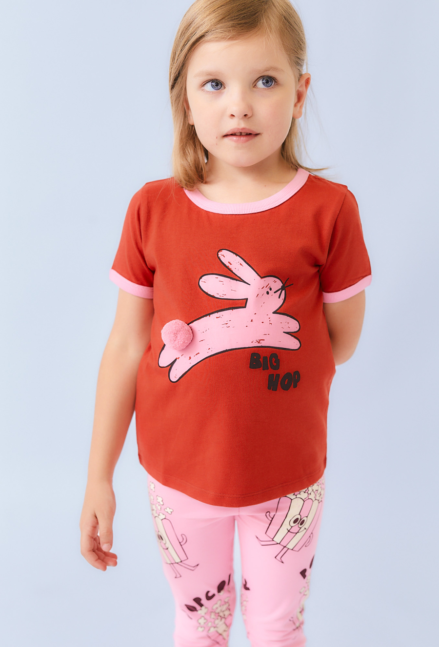 Czerwona koszulka z óliczkiem i pomponem - Limited Edition