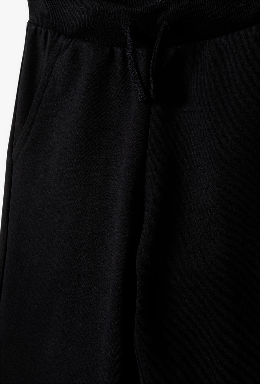 Spodnie dresowe dla chłopca - slim