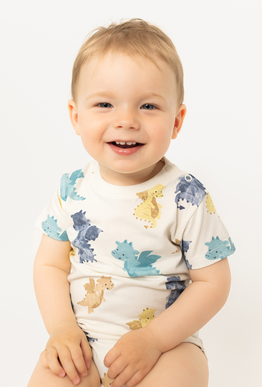 Body niemowlęce z ótkim rękawem - beżowe w smoki