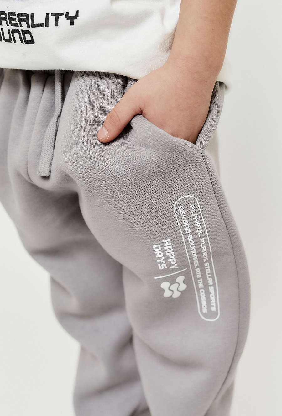 Spodnie dresowe dla chłopca - szare z kieszeniami