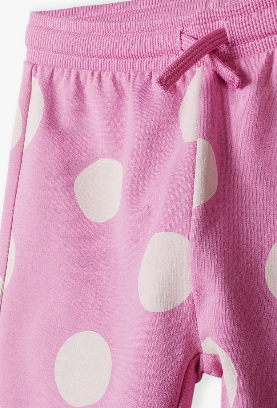 Różowe spodnie dresowe w opki - 510.15.