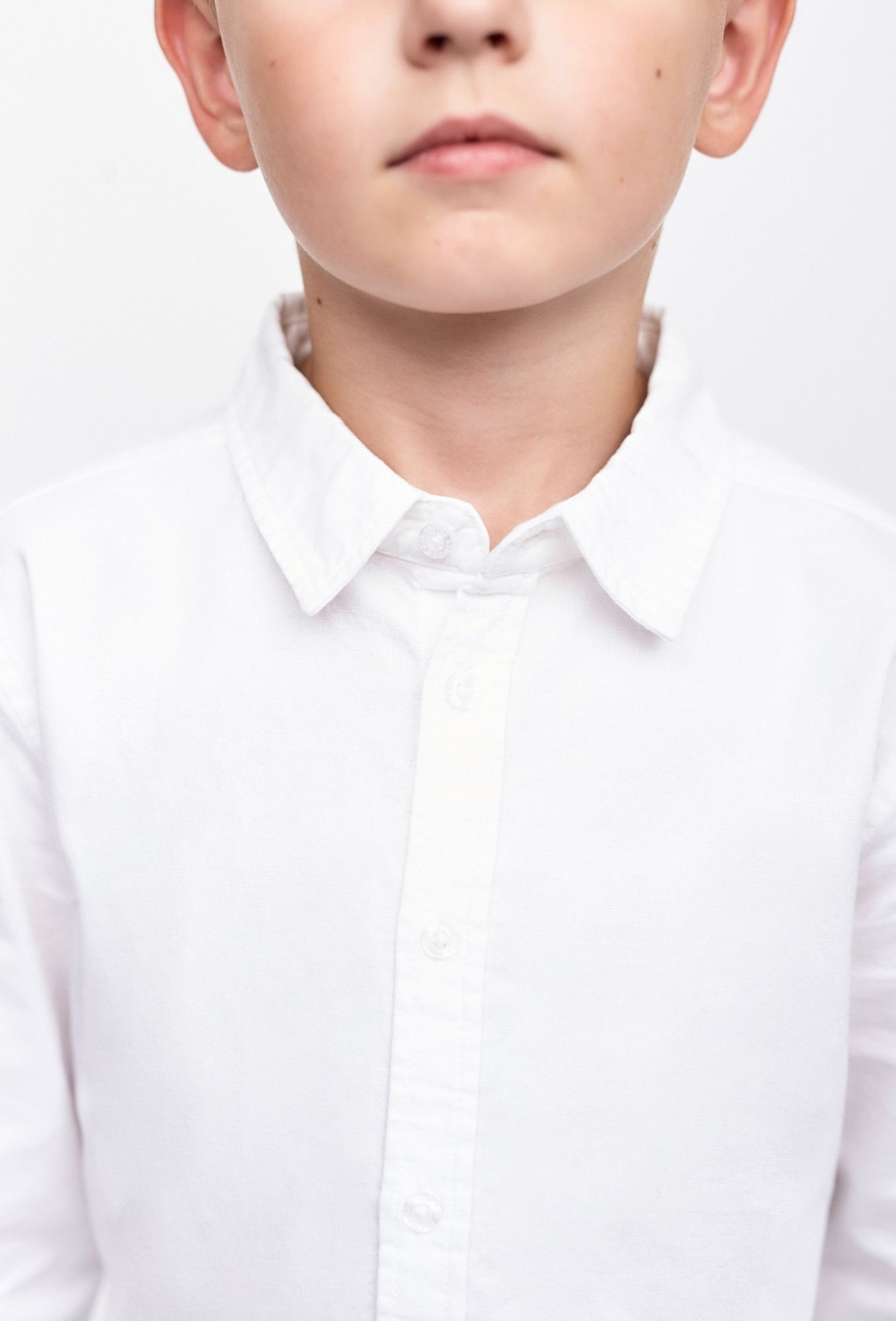 Biała koszula z długim rękawem dla chłopca