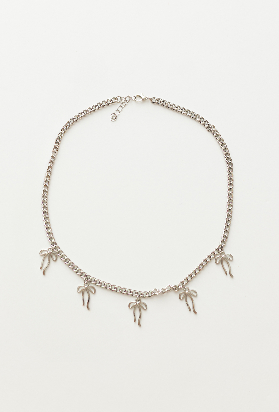 Naszyjnik dla dziewczynki z zawieszkami kokardkami