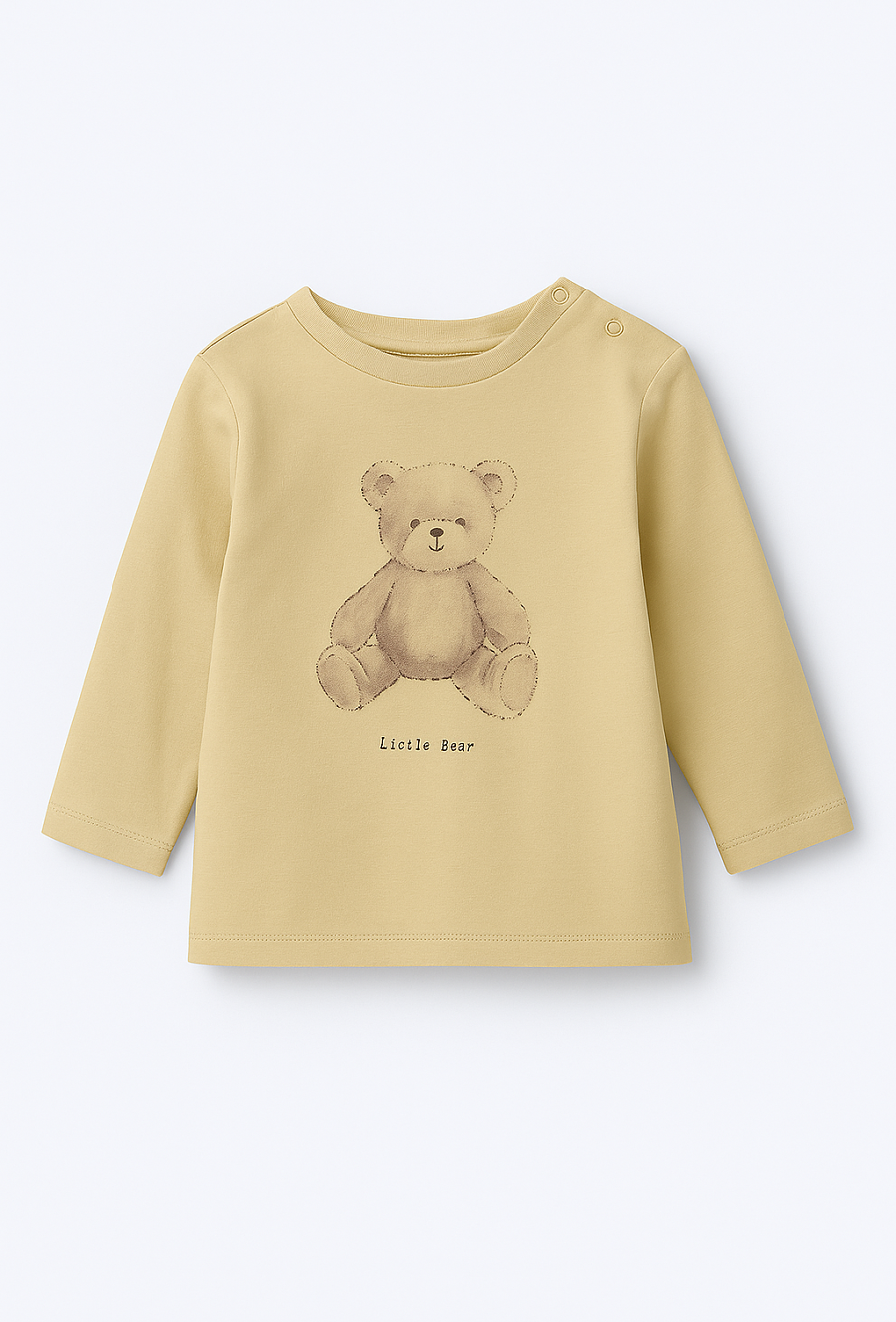 Beżowa bluzka z długim rękawem i nadrukiem misia.