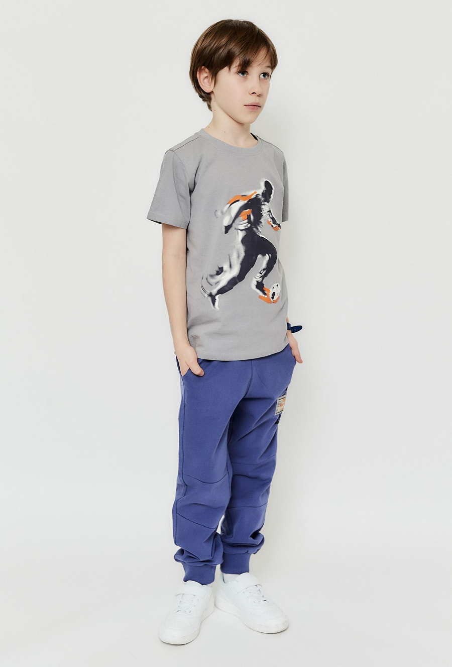 Spodnie dresowe dla chłopca - niebieskie z kieszeniami