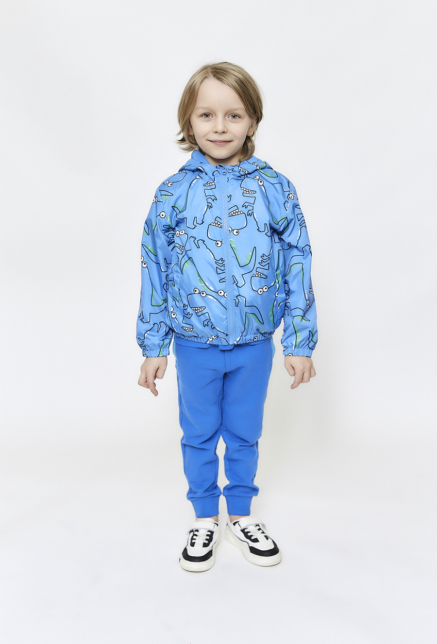 Kurtka chłopięca przejściowa - niebieska w dinozaury