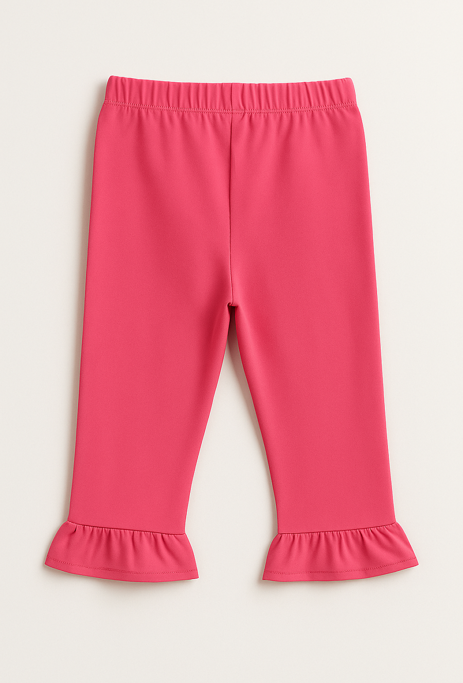 Różowe spodnie wide leg z falbanką i haftem