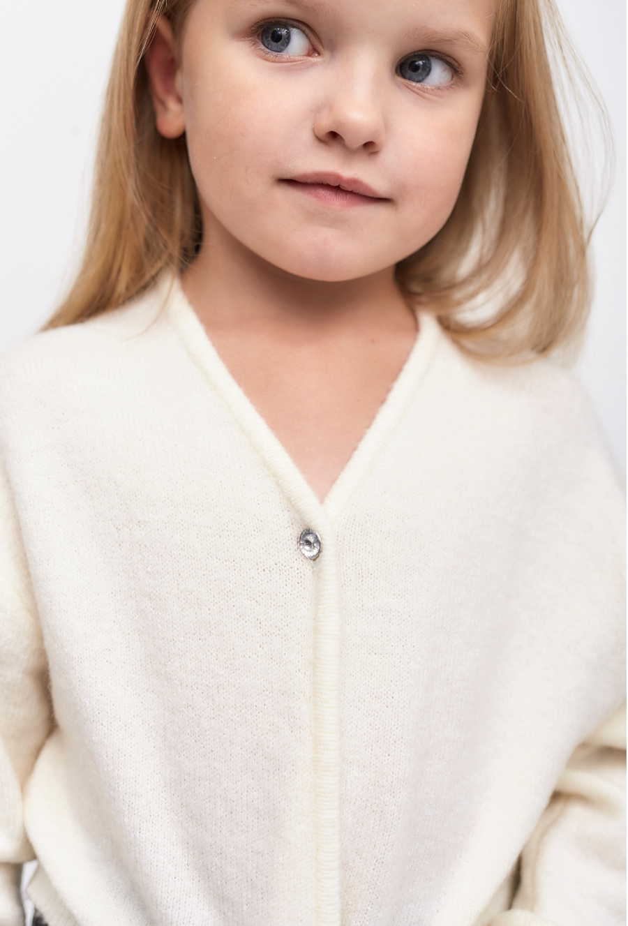 Biały kardigan rozpinany dla dziewczynki