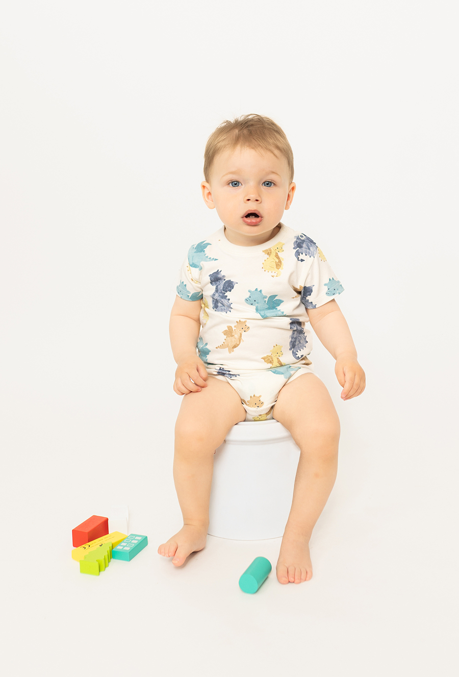 Body niemowlęce z ótkim rękawem - beżowe w smoki