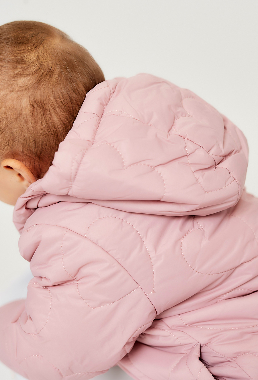 Pikowana przejściowa kurtka dla niemowlaka - różowa- 510.15.
