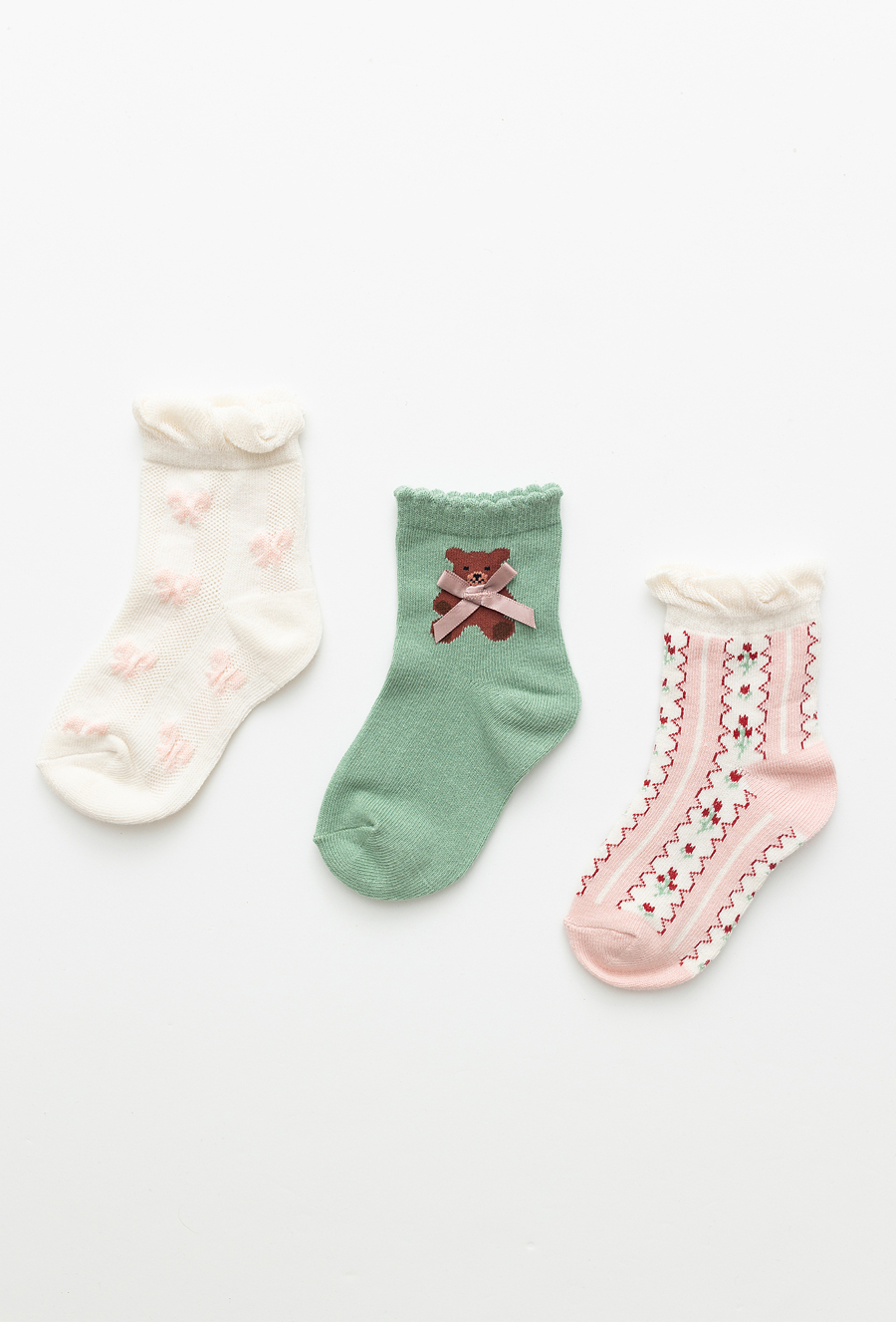 Skarpety dziewczęce 3-pak z kokardką i kwiatkami.
